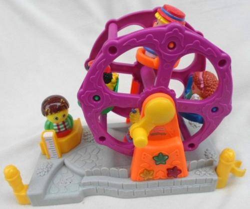 A MUSICAL, ROTATING FISHER PRICE 'LITTLE PEOPLE' FERRIS WHEEL IN WORKING CONDITION!!