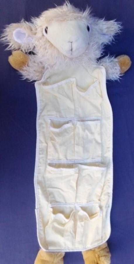 A LOVELY SOFT LAMB ORGANISER FOR BABY OR TO STORE THOSE LITTLE DOLLIES AND TOYS ETC!!