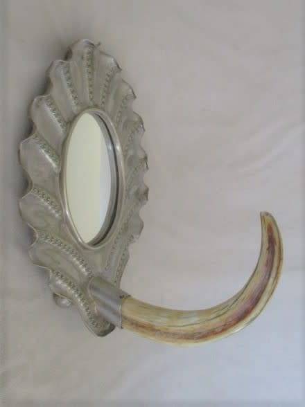 ANTIQUE AND UNIQUE - SILVER METAL FRAMED MIRROR WITH WARTHOG TOOTH HOOK/HANDLE