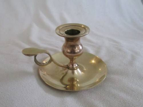 AN OLD FASHIONED SOLID BRASS `WEE WILLIE WINKIE`  CANDLESTICK
