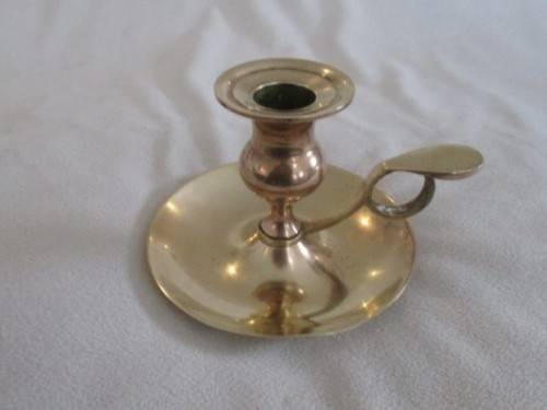 AN OLD FASHIONED SOLID BRASS `WEE WILLIE WINKIE`  CANDLESTICK