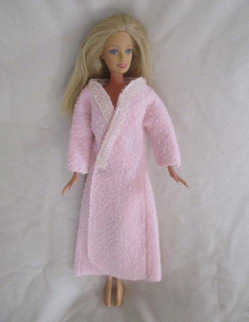 MATTEL BARBIE DOLL IN PJ`S AND GOWN AND WITH KNEES THAT BEND (PLUS EXTRA DRESS)
