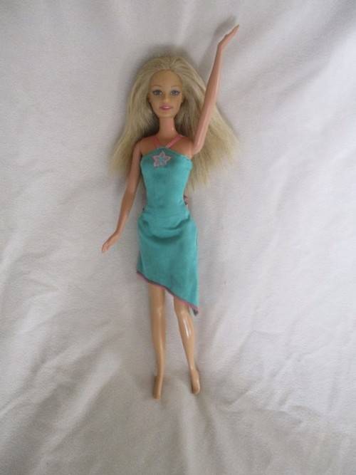 MATTEL BARBIE DOLL IN PJ`S AND GOWN AND WITH KNEES THAT BEND (PLUS EXTRA DRESS)