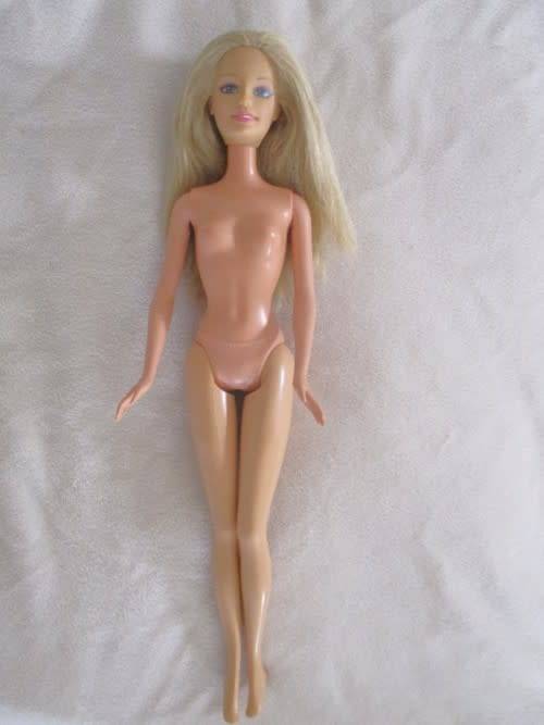 MATTEL BARBIE DOLL IN PJ`S AND GOWN AND WITH KNEES THAT BEND (PLUS EXTRA DRESS)