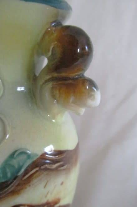 VINTAGE MAJOLICA /FAIENCE VASE WITH RAISED DETAIL AND SQUIRREL HANDLES