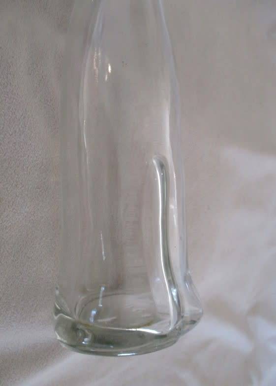 Vintage Cat-shaped bottle (complete with curly tail)