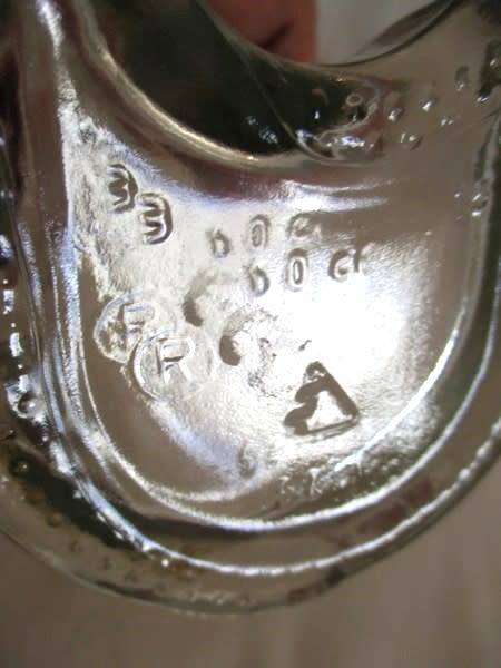 Vintage Cat-shaped bottle (complete with curly tail)