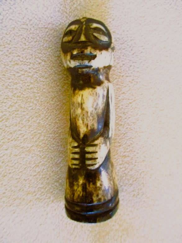 Two very old carved bone Luba/Songwe, Congo potion holders/talismans with original stoppers