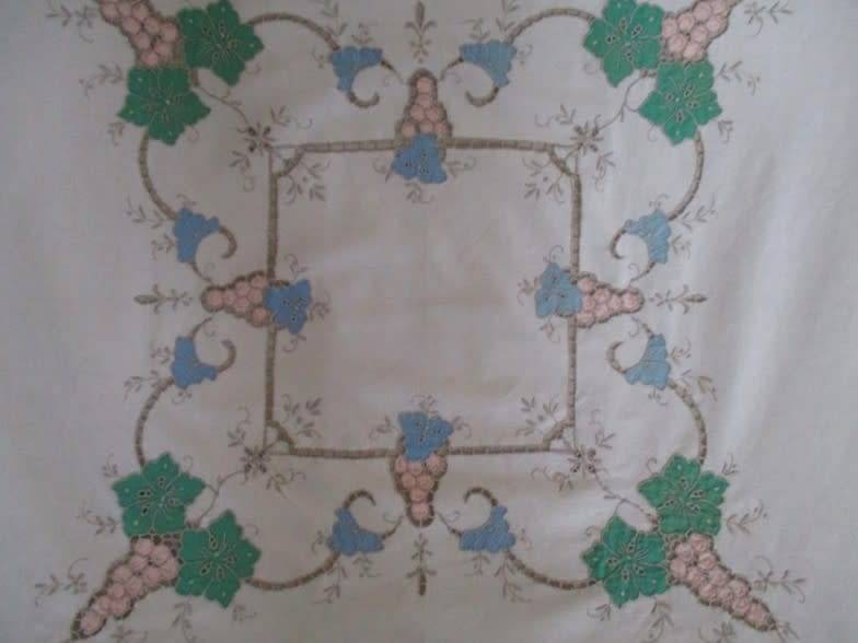 A large vintage embroidered Madeira table cloth with lovely detail