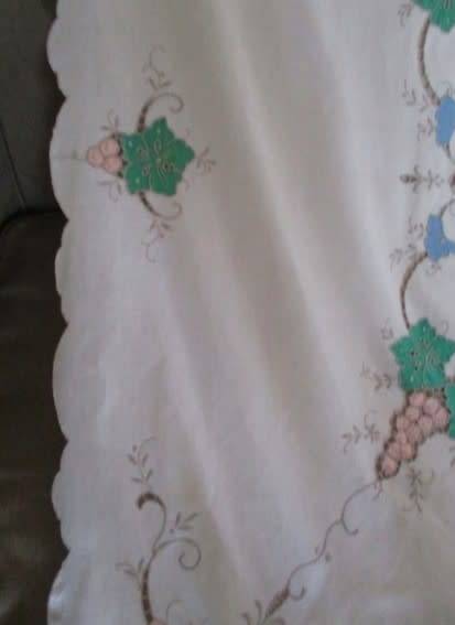 A large vintage embroidered Madeira table cloth with lovely detail