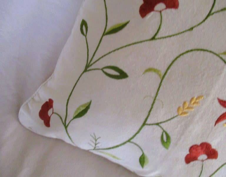A beautiful, good quality embroidered cushion