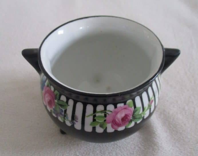 Just a pretty little `whatnot` pot with pretty pink roses