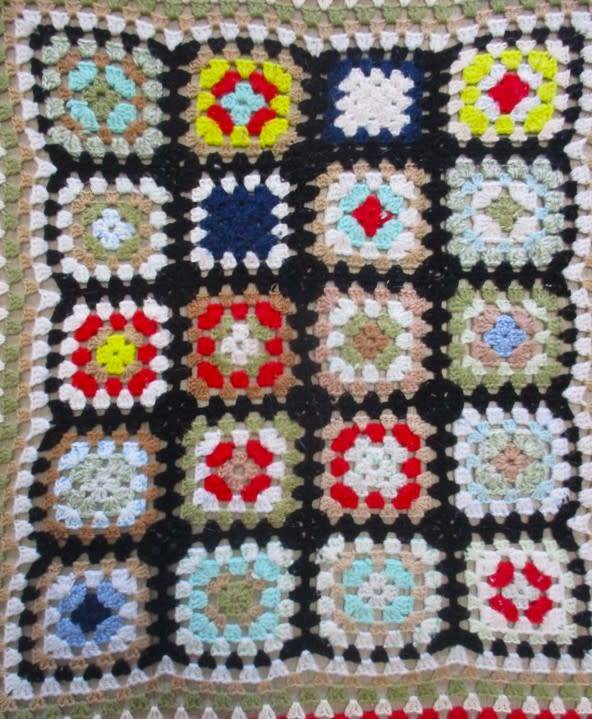 A hand crocheted wool blanket with soft colours - 190cm x 176cm