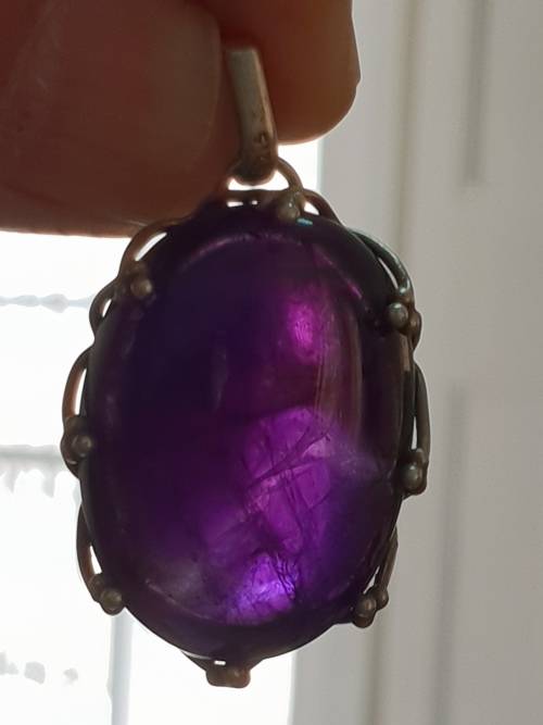 OVAL AMETHYST STONE SET IN SILVER CLAW SETTING    ( 925 )