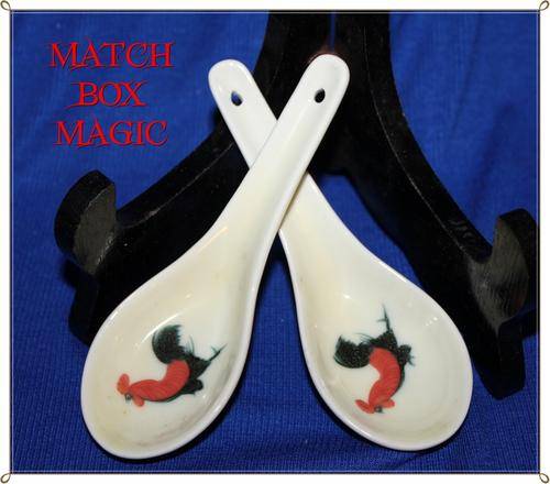 TWO CLASSIC PORCELAIN ORIENTAL SPOONS DECORATED WITH A ROOSTER
