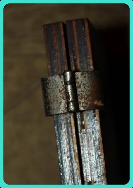 OLD WOODEN  PRESS WITH UNUSUAL CLASP