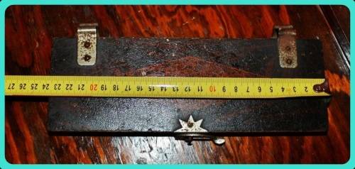 OLD WOODEN  PRESS WITH UNUSUAL CLASP