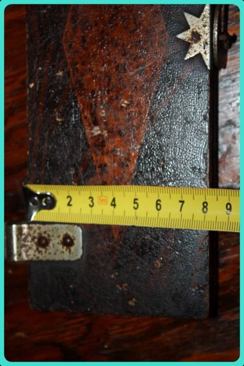 OLD WOODEN  PRESS WITH UNUSUAL CLASP