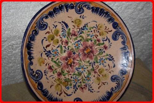 VINTAGE HAND PAINTED FLORAL WALL PLATE FROM PORTUGAL  STAMPED ON BACK