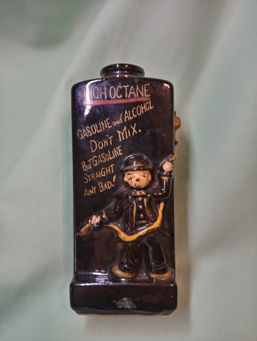 Royal avon PETROL ATTENDANT DECANTER WITH HUMEROUS SAYING  NO CORK