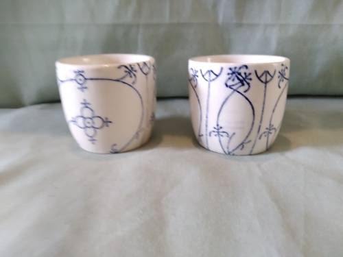 Pair of blue and white straw pattern Polish egg cups attributed toJaworzyna Slaska (Konigszelt)