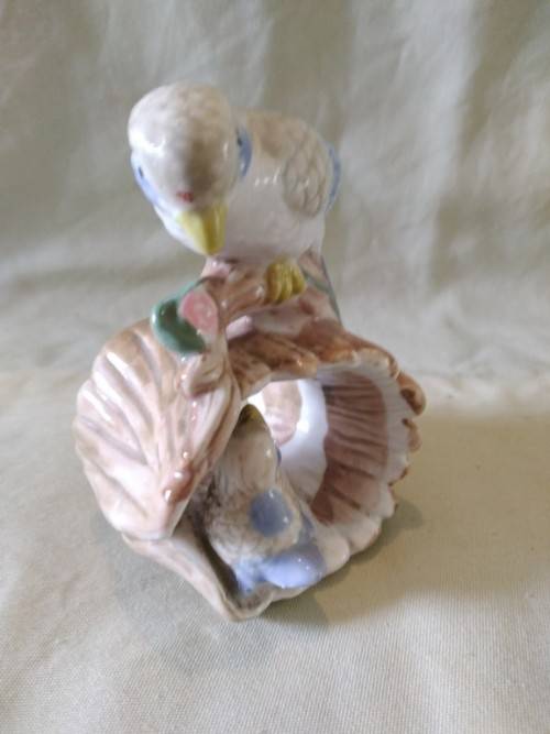 Hiding from Mum porcelain bird figurine too sweet
