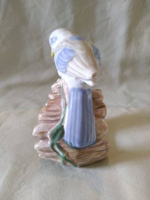 Hiding from Mum porcelain bird figurine too sweet