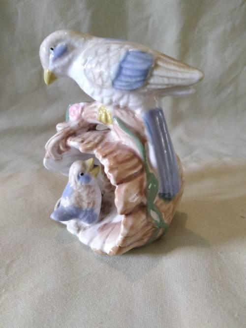 Hiding from Mum porcelain bird figurine too sweet