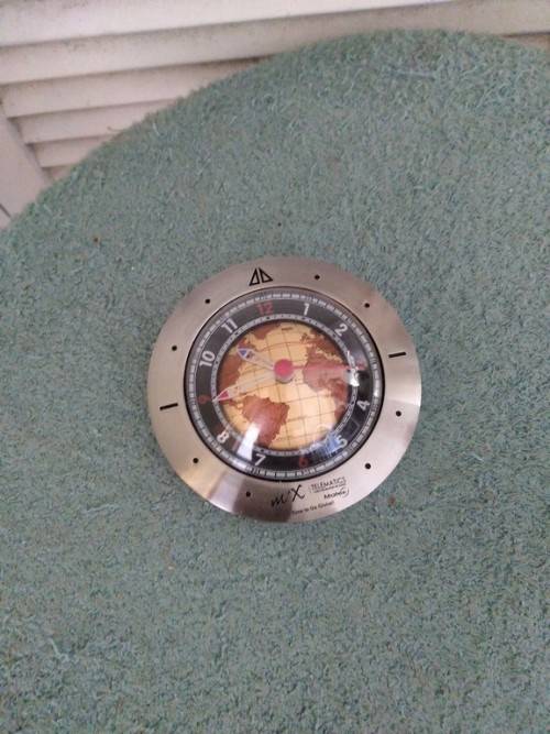 Globe desk clock unusual can lie flat or be upright in working order