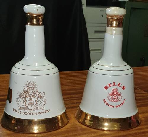 BELL'S COMMEMORATIVE ONE EMPTY ONE FULL AND SEALED