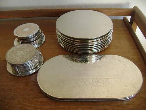LARGE COLLECTION OF SILVER PLATED PLACE MATS AND COASTERS (29 PIECES) - SOLD TOGETHER AS ONE LOT
