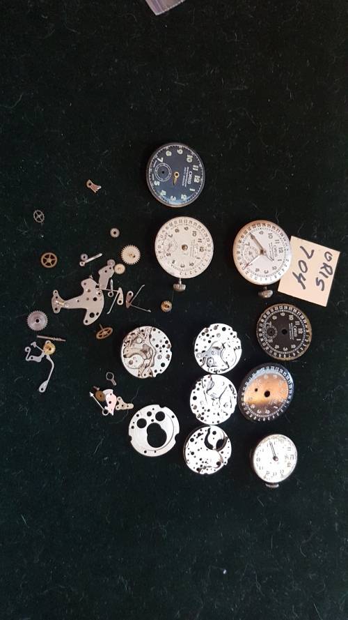 Lot of Oris 704 watch movements and spares.