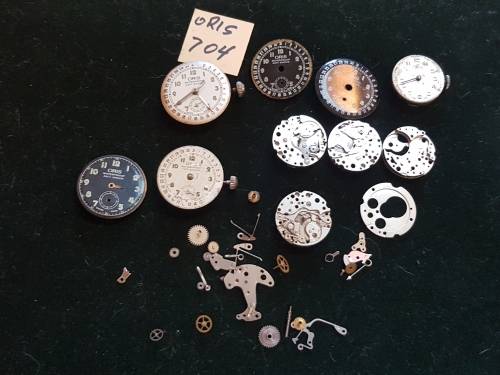 Lot of Oris 704 watch movements and spares.