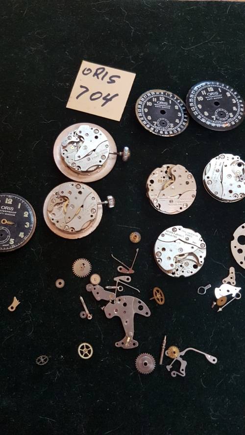 Lot of Oris 704 watch movements and spares.