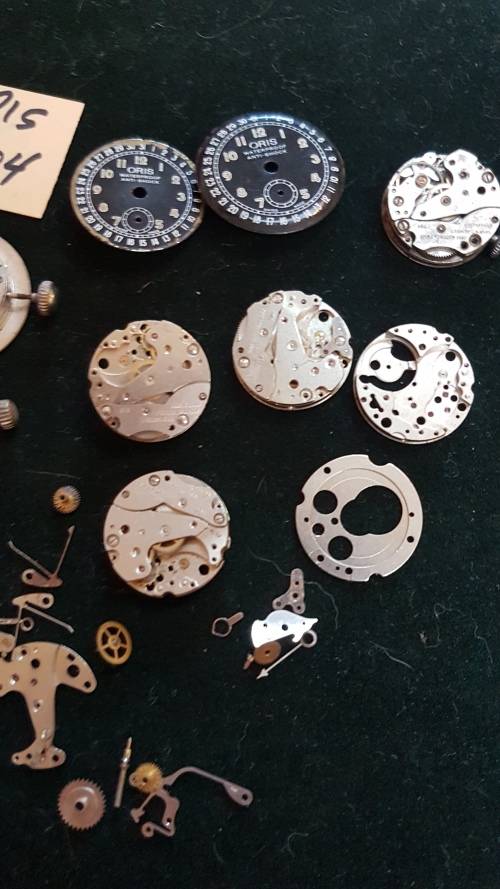 Lot of Oris 704 watch movements and spares.