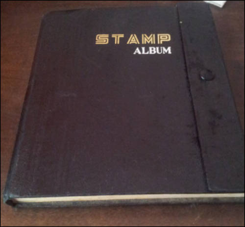 ***BLACK STAMP ALBUM FILLED WITH WORLD STAMPS @ BARGAIN PRICE***