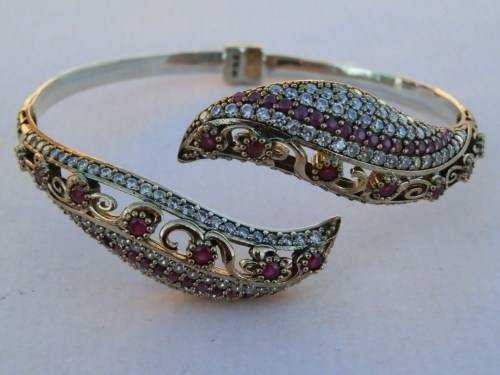 Sterling silver ruby bangle, 21.5 g.