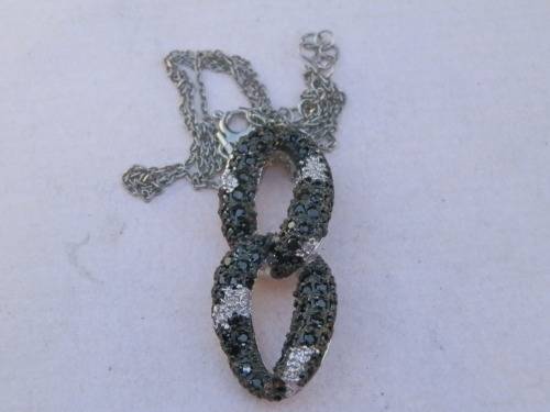 Sterling silver pendant and chain, 5.6 g.