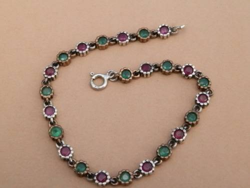 Sterling silver ruby and emerald bracelet, 7.6 g.
