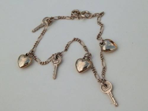 BARGAIN!!  Awesome SOLID 9 ct gold charm bracelet.  Thirty (30) days to pay