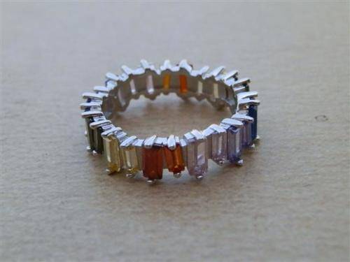 Spectacular solid sterling silverblue sapphire, amethyst and topaz ring - weight 4.26 g.