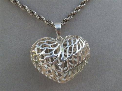 Awesome heavy solid sterling silver rope chain and a large filigree heart pendant - weight 21.94 g.