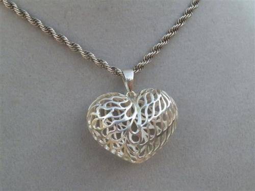 Awesome heavy solid sterling silver rope chain and a large filigree heart pendant - weight 21.94 g.