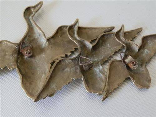 Vintage brass flying ducks