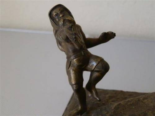 Antique brass gnomes paper weight