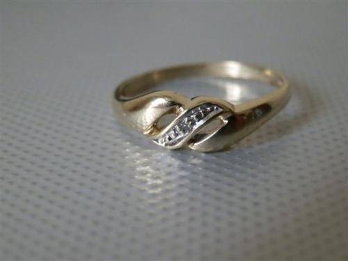 Awesome solid 9 ct natural diamond ring