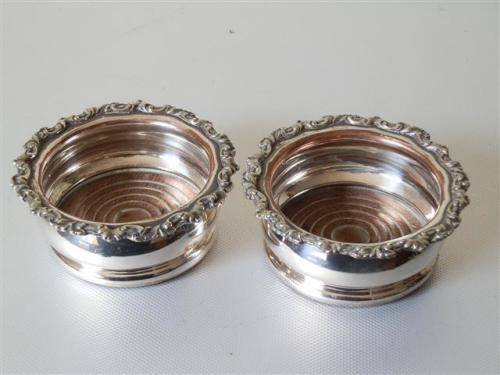 Pair of Victorian Silver Plate on Copper Coasters with Turned Wooden Basis.