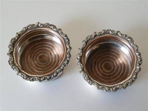 Pair of Victorian Silver Plate on Copper Coasters with Turned Wooden Basis.