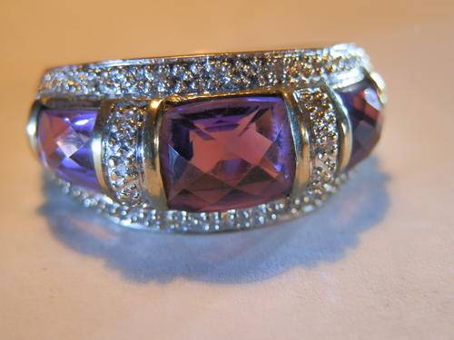 9 ct Gold - 3.8 gram - diamond and amethyst ring - thirty (30) days to pay. Value R8,580