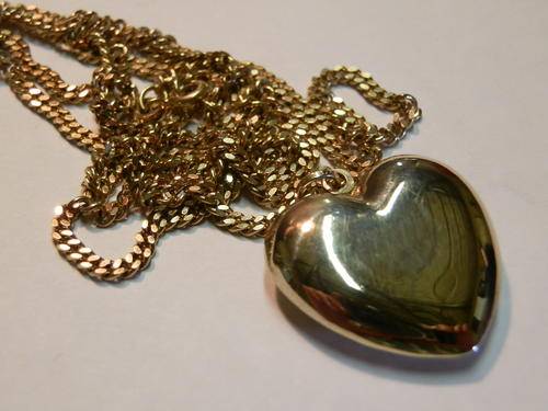 Heavy - 11.7 gram - 9 ct gold neck pendant and chain. Value R11,600